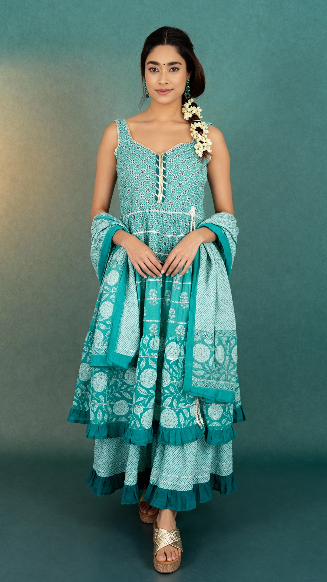 Elbow style dupatta drape on Floral sharara suit