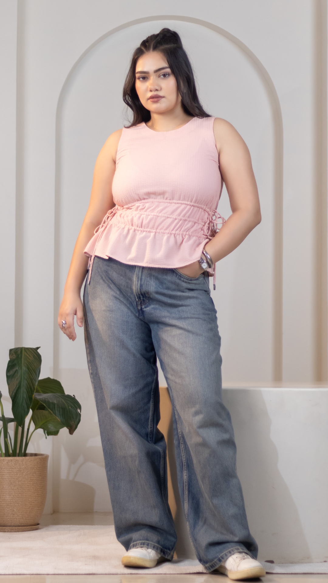 Peach Tie-up Peplum Top To Create a Stylish Airport Outfits For Women