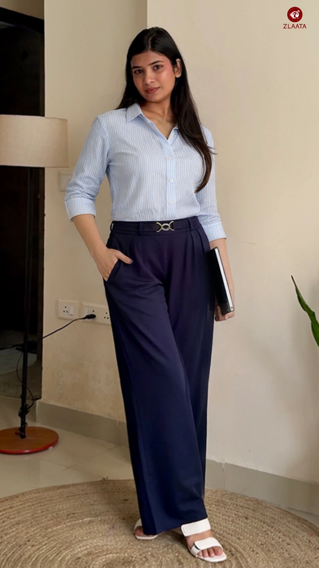 Blue striped shirt with navy blue pants