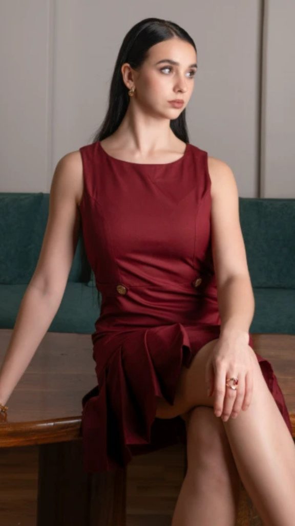 Maroon Formal Pleated Hem Shift Dress with ponytail hairstyle